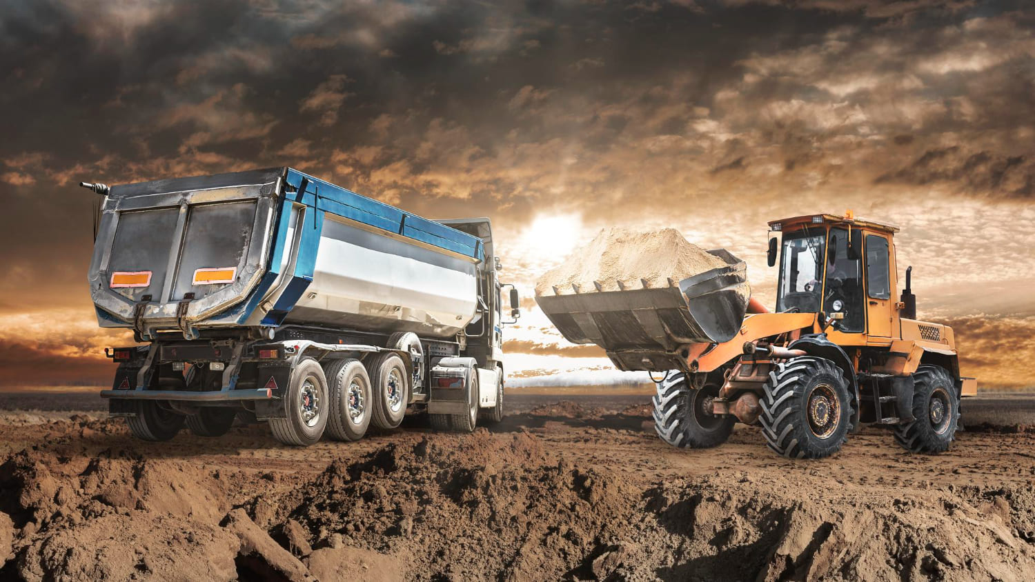 Heavy equipment and warehouse logistics — fleet and yard operations supporting bulk cargo
